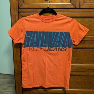 Calvin Klein Jeans Vibrant Orange Tee with Navy Print